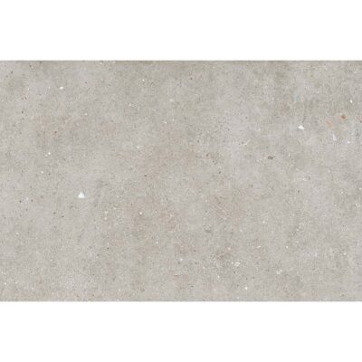 Primer plano de un azulejo Glamstone Grey, mostrando su base de efecto cemento gris con incrustaciones de pequeños fragmentos brillantes.