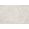 Primer plano de un azulejo rectangular Glamstone White, con una base clara de efecto piedra y salpicado de pequeños fragmentos de colores.
