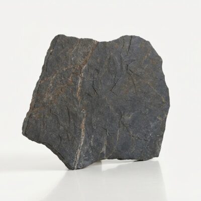 Muestra de suelo porcelánico rústico Montesa Antracita con textura y vetas claras.