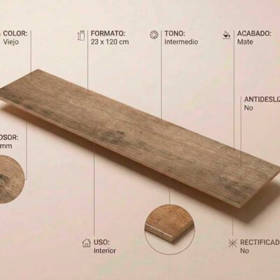 Una baldosa porcelánica de 23x120 cm con textura de madera Merbau Viejo y acabado mate.