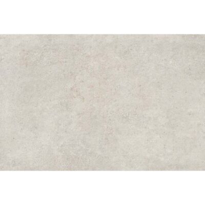 Primer plano del porcelánico Crassana Pearl con efecto cemento en color blanco perla.