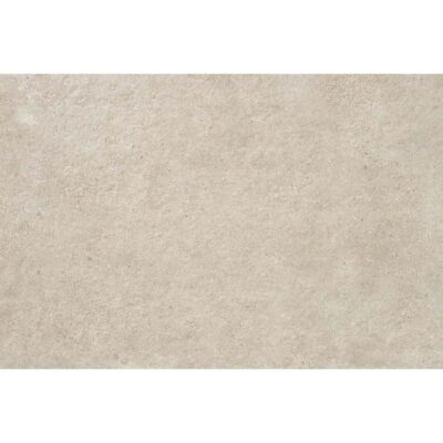 Primer plano del porcelánico Crassana Natural de efecto cemento gris.