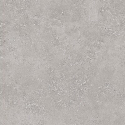 Primer plano de una baldosa cerámica, modelo Flax Grey, que combina una textura de efecto cemento con un tono gris medio.