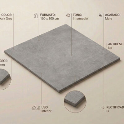 Un azulejo porcelánico gris oscuro de 100x100 cm con efecto cemento y acabado mate.