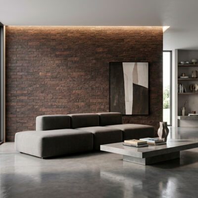 Pared de salón moderno con azulejo efecto piedra rodeno. El color rodeno crea un ambiente cálido.