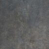 Azulejo con efecto cemento, modelo Feroe Tobacco, en un color marrón oscuro con matices que simulan la textura del cemento.