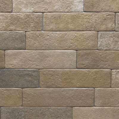 azulejo rústico porcelánico tosca beige con formato tipo ladrillo y textura irregular efecto piedra para revestimiento de pared interior o exterior