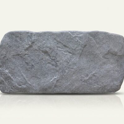 Baldosa porcelánica country gris con superficie texturizada y bordes naturales.