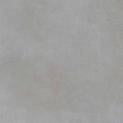 Primer plano de una baldosa cerámica modelo Indeed Grey, con una textura y acabado que imitan fielmente el cemento pulido en tono gris.