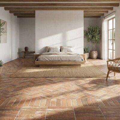 Dormitorio con suelo porcelánico imitación barro tosca teja en espiga