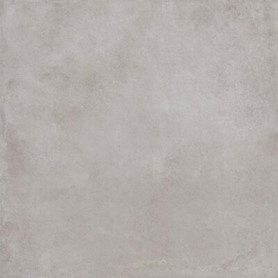 Baldosa porcelánica efecto cemento gris medio, acabado mate estilo urbano para pavimento y pared.