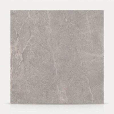 Azulejo porcelánico gris imitación cemento con vetas claras. Ideal