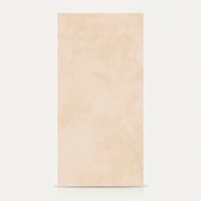 Una baldosa rectangular de suelo porcelánico color crema con efecto cemento.