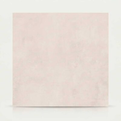 Azulejo rectangular de suelo porcelánico imitación cemento Columbia Pearl en tono perla claro.