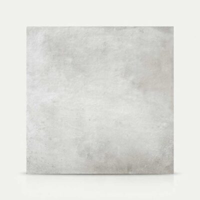 Un azulejo de suelo porcelánico Stoneage Concrete gris claro con textura de cement