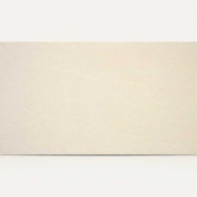 Azulejo porcelánico Halton Cream de color crema con textura sutil efecto cemento.