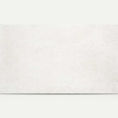 Azulejo cerámico rectangular blanco con textura de cemento.