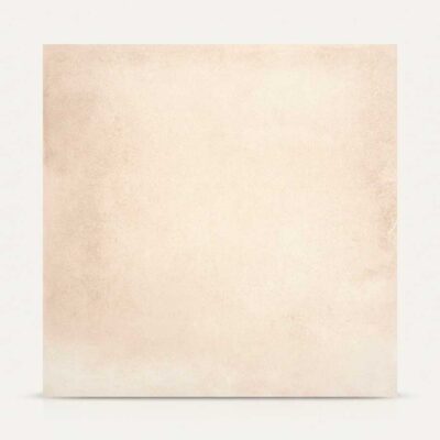 Baldosa porcelánica color crema con textura de cemento sobre fondo claro.