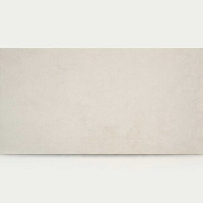 Baldosa porcelánica tipo cemento Balance Grey de tono gris claro con textura sutil.