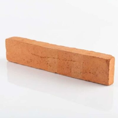 Pieza rectangular de barro cocido con acabado rústico destonificado, tonalidad cálida anaranjada y textura natural de terracota.
