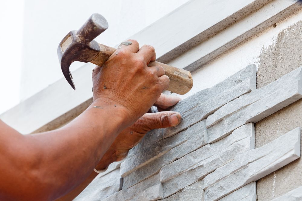 Revestimiento de pared colocado con junta visible