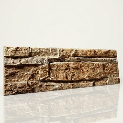 Pieza rectangular de azulejo con textura de piedra en tonos marrones y beige, acabado rústico y relieve pronunciado que simula mampostería natural.