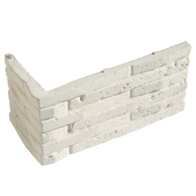 Pieza de esquina en formato angular para revestimiento con textura de piedra natural en tonos beige crudo. Superficie rugosa y acabado mate con detalle de mampostería irregular.
