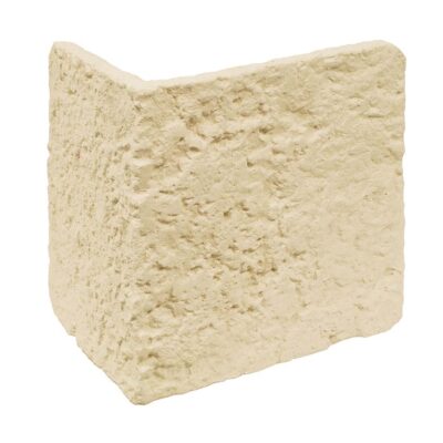 Pieza angular de revestimiento de hormigón con textura rústica imitación piedra en tonos beige dorado, acabado mate rugoso, diseñada como esquina exterior.