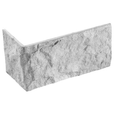 Pieza de esquina en aplacado imitación piedra gris con textura natural irregular y acabado mate rústico.