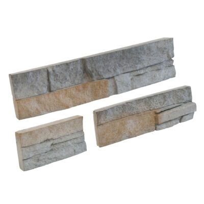 Tres piezas de aplacado de hormigón con efecto piedra en tonos grises y beige. Formato rectangular irregular con bordes naturales y textura rugosa imitando mampostería de piedra para revestimiento de pared.