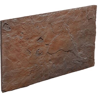 Pieza rectangular de revestimiento con efecto piedra pizarra en tonos cobrizo y marrón. Superficie rugosa y texturizada con acabado mate, presentando fracturas y relieves que simulan piedra natural.