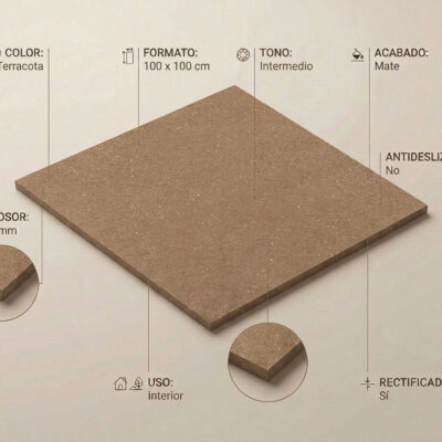 Baldosa porcelánica rectangular de formato 100x100 cm con acabado mate e imitación piedra en tonalidad terracota. Superficie con textura granulada y veteado sutil, rectificada.